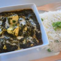 Palak Paneer · Cottage  cheese cooked with spinach and spices in a creamy flavorful sauce. Served with Rice...