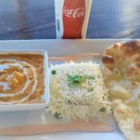 Chicken Korma Combo · Boneless chicken in a creamy tomato onion gravy with dry cocunut and nuts.Served with Rice P...