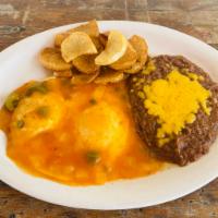 Huevos Rancheros  Breakfast · Served with potatoes and double refried beans.