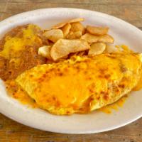 Mexican Omelette Breakfast · Tomato, onion, poblano, Monterrey jack cheese, with potatoes, and double refried beans.