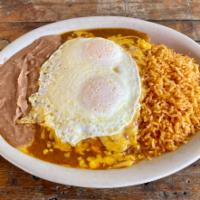 Enchilada con Huevos Breakfast · 2 beef or cheese enchiladas with 2 over easy eggs, rice and beans.