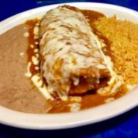 Chimichanga Dinner · Served with chile con carne sauce, rice and beans