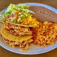 Taco Dinner · Shredded chicken or taco meat. Two crispy or soft tacos with lettuce, tomato, and cheese ser...