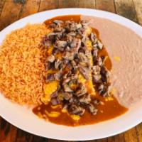 Enchiladas de Fajita Dinner · 2 cheese enchiladas topped with beef or chicken fajita, chile con carne sauce, rice and beans.