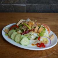House Green Salad · Fresh garden vegetables, tomato, cucumber and topping by fried tofu and peanut dressing.