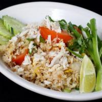 Fried Rice  · Fried rice with eggs, tomatoes, green onion, yellow onion, cilantro