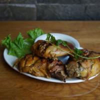 BBQ Chicken · Marinated BBQ chicken thigh (bone-in). Served with sweet and sour sauce.