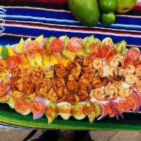 6. Tequila's Botana · Our most emblematic botana! Combines three delicious jumbo shrimp recipes, grilled sautéed w...