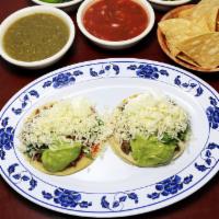 35. Super Taco · Tasty corn tortilla filled with your choice of favorite meat, fresh guacamole, sour cream, c...