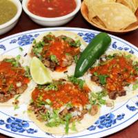 37. Soft Taco · Tasty corn tortilla filled with favorite meat choice, onion, cilantro, and salsa.