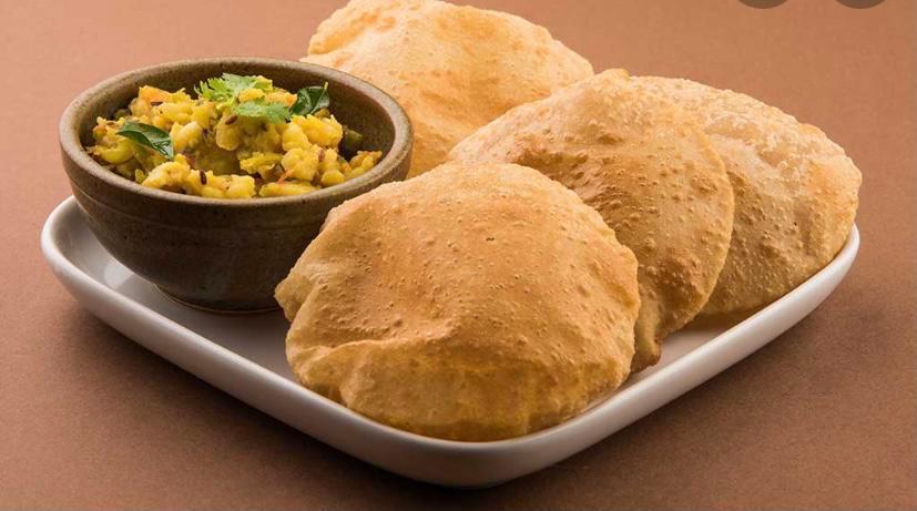 Poori Bhaji · Baby potatoes pan stir field and tempered with curry leaves and mild spices served with poori bread