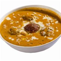 Malai Kofta · Vegetable balls cooked with cream and special sauce.