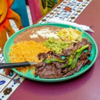 Carne Asada · Skirt steak butterflied and flame-broiled to your liking. Served with guacamole. These items...