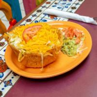 Deluxe Taco Salad · Choice of chicken or beef served with sour cream and guacamole. 