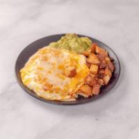 Huevos Rancheros · Corn tortilla, black beans, fried eggs, ranchero sauce, mozzarella, cheddar cheese, guacamol...