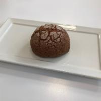 Double Chocolate Melon Pan · Ganache ( chocolate with heavy cream ) inside sweet roll dough wrapped with chocolate cookie.