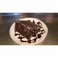 CHOCOLATE CAKE · Colossal...Layer upon layer of dark, moist chocolate cake & silky, smooth chocolate filling....