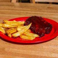Baby Back Ribs · Rack of fall-off-the-bone, baby back ribs. Dry rubbed, seared and slow cooked. Finished on t...