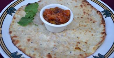 Naan · Classic leavened bread made with white flour.