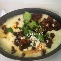 Queso Fundido Dinner · Melted chihuahua cheese served with your choice of flour or corn tortillas and your choice o...