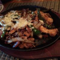 Parrillada Dinner · Sizzling skillet choice of: cheese, chicken, beef carnitas or vegetarian, sauteed with pinea...