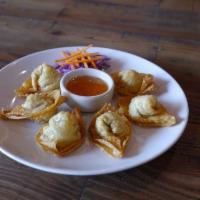 6 Piece Fried Wonton · Deep fried wontons stuffed with ground pork. Served with sweet and sour sauce.