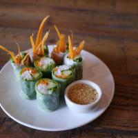 2 Piece Salad Rolls · Fresh vegetable rolls wrapped with rice paper, served with sweet tangy sauce with peanuts.