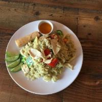 Green Curry Fried Rice · Green curry paste stir fried with rice, green beans, bell pepper, and fresh basil.
