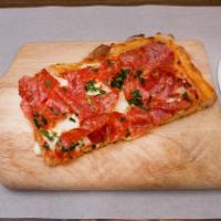 Diavola Pizza · Tomato sauce, mozzarella, cherry tomatoes and spicy salami.