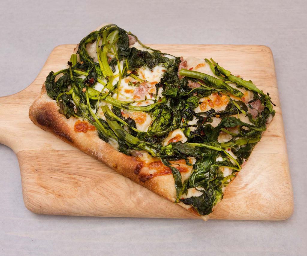 Salsiccia e Broccoli Pizza · Mozzarella cheese, sausage and broccoli rabe. A touch spicy.