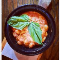 Gnocchi Sorrentina   · Homemade Gnocchi in Tomato Sauce with Melted Mozzarella and Parmigiano Cheese