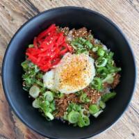 Spicy Bakudan Rice Bowl · Rice, onsen egg, spicy ground chicken, green onion, sesame seed, shichimi pepper, red ginger.