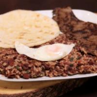 Calentado Plate · Mixed rice and beans, grilled steak, Colombian style eggs and corn cake.