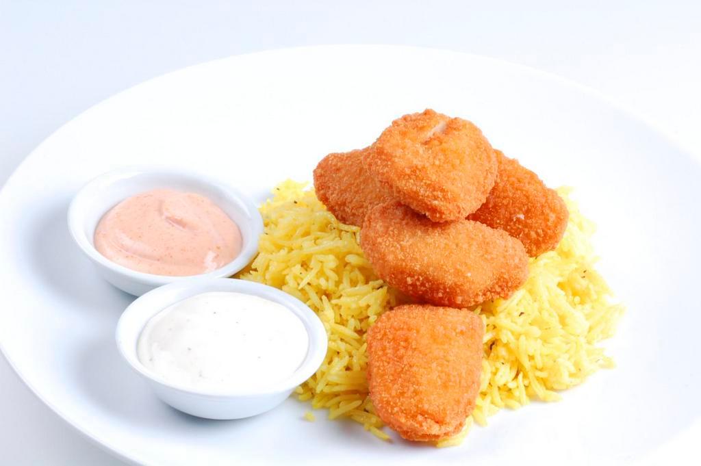 Kids Chicken Nuggets · Includes rice or fries.