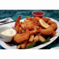 1/2 Lb Fried Shrimp Dinner · Golden brown fantail shrimp served with french fries, French bread and cocktail sauce.
