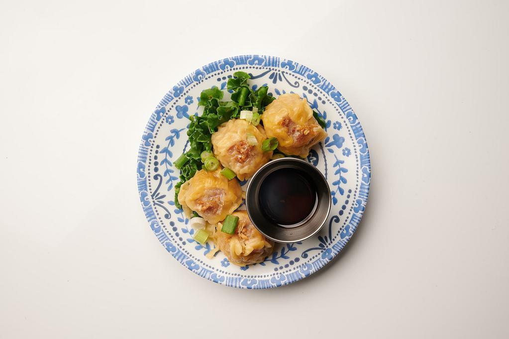 Thai Dumpling (4pcs) · The combination of pork and shrimp dumpling served with sweet and sour soy sauce.