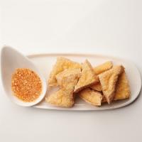 Fried Tofu · Fried tofu served with sweet chilli sauce topped with grounded peanut. Gluten-free. Vegan.