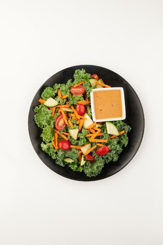 A Gusto Salad · Kale, cherry tomatoes, carrot, cucumber served with peanut sauce on the side. Gluten-free, vegan.