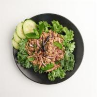 Lucky Piggy · Larb. Spicy and sour ground pork salad mixed with Thai herbs, mint, scallion, red onion. Glu...