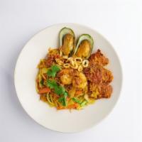 PHUKET NOODLE · Stir-fired Rice Vermicelli, Seafood  with curry powder, Egg, scallion, Onion, carrot, beansp...