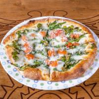 Ruchetta Pizza · Organic arugula baked on the pizza with olive oil, garlic, and mozzarella cheese, and topped...