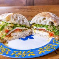 Chicken Pesto Arugula Gourmet Sub · Roasted all natural chicken breast served on house-made ciabatta with your choice of mozzare...