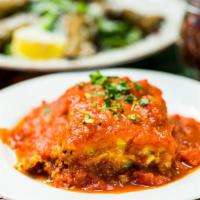 Homemade Lasagna · A Pasquini family recipe with ground beef, Ricotta, Mozzarella, marinara and Parmesan. Inclu...