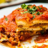 Family Lasagna · Our family recipe with ground beef, Ricotta, Mozzarella, marinara and Parmesan. Our family s...