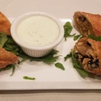 Tex-Mex Chicken Egg Rolls · Hand-pulled chicken, black beans, grilled corn, Colby Jack cheese, and jalapeno ranch.