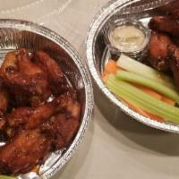 Tavern Chicken Wings · Celery, carrots & creamy blue cheese dressing.
Choice of Honey Chipotle, Buffalo, Cilantro T...
