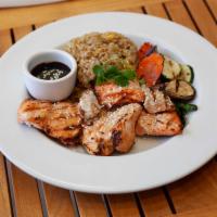 Grilled Salmon Rice Plate · A choice of egg fried rice or a sunny side up egg over steamed rice. Served with grilled sea...