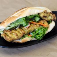 Grilled Chicken White Meat Banh Mi · French bread, cilantro, green leaf, pickled daikon and carrot.
