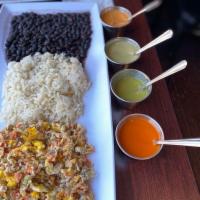 Huevos a La Mexicana · scrambled egg with tomato, onion and serrano pepper, served with rice, beans and handmade co...