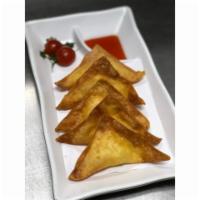 Umi's Crab Rangoon · 5 pieces. Fried wonton wrapper filled with crab and cream cheese. 